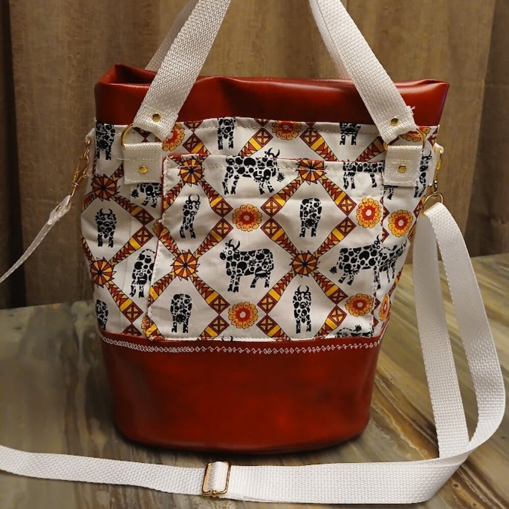 New Bucket Saddle Bag Purse Tote Red White Cow Bulls Southwestern print Pleather